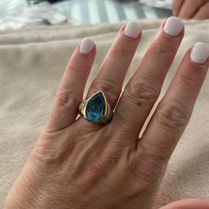 Blue Topaz 14KT gold stunning ring with diamonds